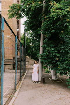 young woman in front of urban decay