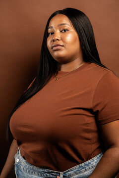 Close-Up of African American Against Brown Background