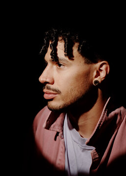 A man with a black background