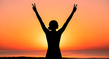 Fototapeta premium African American woman stretching arms at sunrise^ Young woman celebrating with raised arms against sunset backdrop 