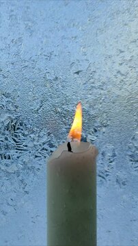 Frozen glass melts from burning candle №2
