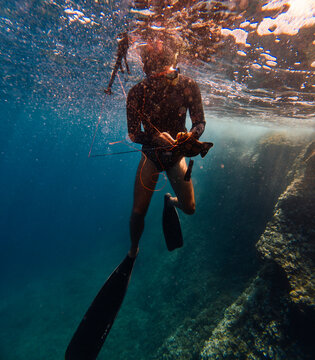 Diver caught a fish