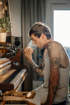 The artist drinks water