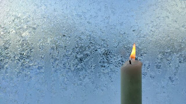 Frozen glass melts from burning candle №1