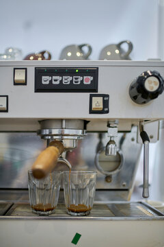 Brewing Espresso at a Caf&eacute; With Dual Glasses