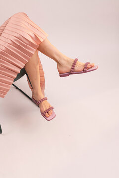 Woman in Pink Dress with Stylish Sandals