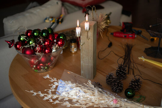 Table with DIY Christmas decorations
