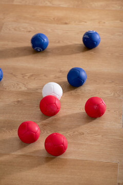 Set of balls for playing boccia on the court