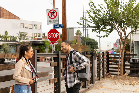  Friends Share a Laugh During a Relaxed City Walk