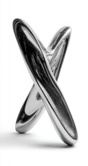 Two intersecting, metallic, teardrop-shaped forms cast a shadow against a white backdrop