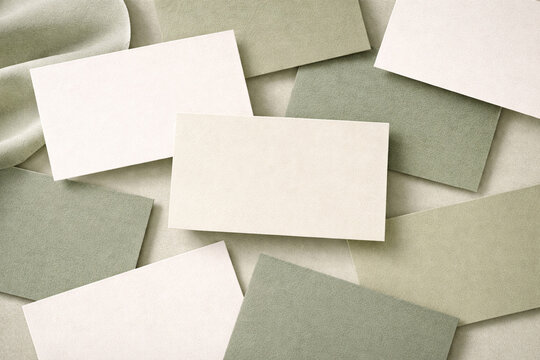 Minimal business card mockup on soft green neutral background