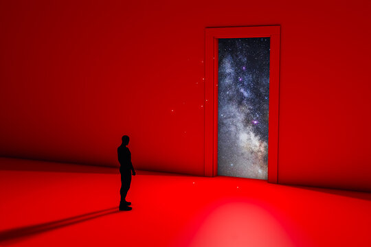 A man silhouette gazing at a cosmic doorway amidst a red backdrop
