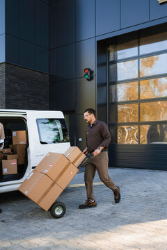 The postman is preparing to send parcels