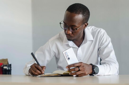 Business man taking notes