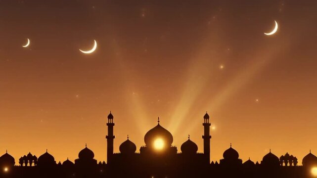 Silhouette of a mosque at sunset with crescent moons.
