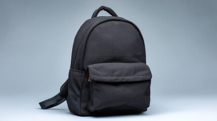 Fototapeta premium Minimalist Black Backpack Design for Stylish Daily Use, Travel, School, and Outdoor Adventures with Durable Material and Functional Pockets