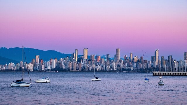 Beautiful pink sunset in City harbour and marina. Vancouver, BC. Canada. Kitcilano