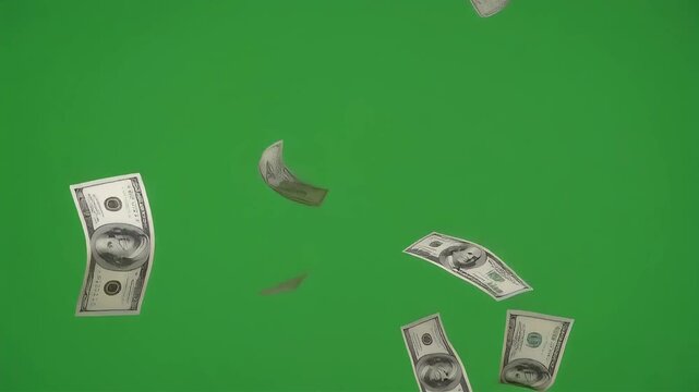 A seamless looping video shows endless falling generic paper money with subtle airflow movement on a flat green screen background