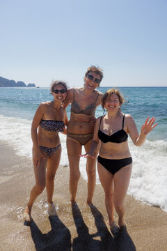 portrait of a family on the beach