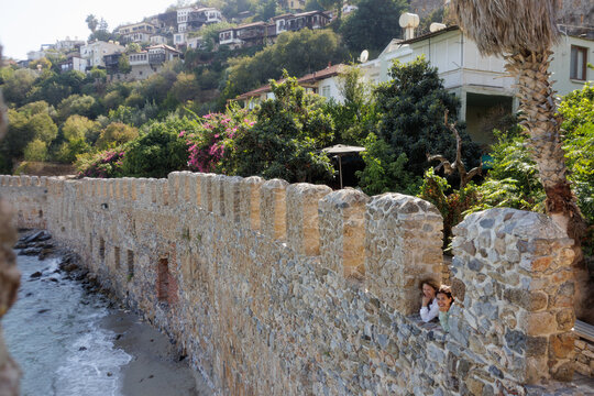 landscape. two women stand on the fortress of Alanya