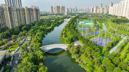Wuhan Ecological Corridor Aerial View with Modern Bridge and Green Parks © TranPhuoc
