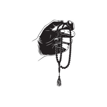 Hand holding Islamic prayer beads, Tasbih, Sebha, Muslim devotion