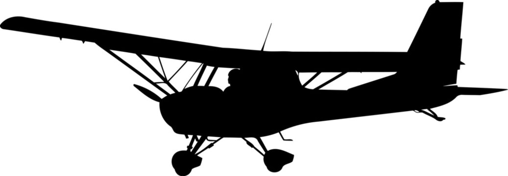 Light aircraft bush plane in flight silhouette