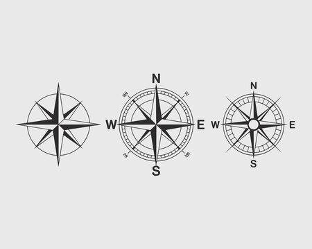 Set of three graphic compasses illustrating navigation and direction, perfect for travel, adventure, business strategy, exploration, and wayfinding design elements. Stylized cartography symbols for gu