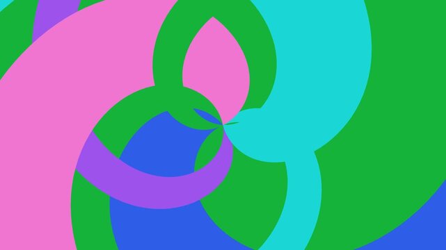 Hypnotic abstract colorful shapes twist and swirl dynamically on a green background.  The shapes interlock and rotate smoothly against a solid green backdrop.
