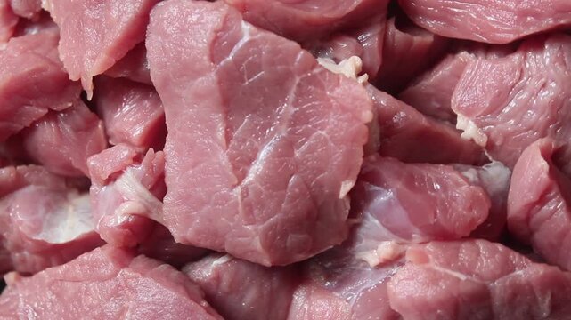 top view of a pile of raw beef cuts