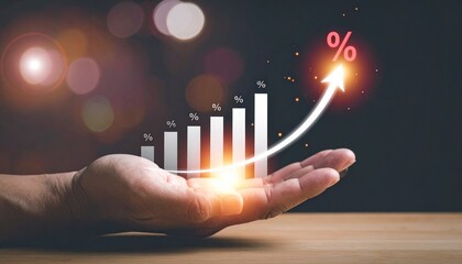 Hand holding ascending bar graph with glowing red peak