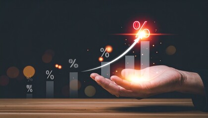Hand holding ascending bar graph with glowing red peak