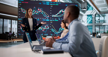 Fototapeta premium Diverse Team Meeting For Stock Trading Education