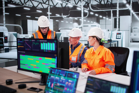 Engineer Monitoring Construction Plant With SCADA Software