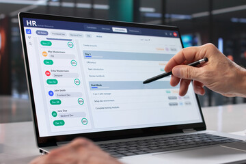 Corporate HR Executive Using Software To Schedule Interviews