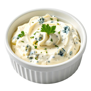 Creamy blue cheese dip with fresh parsley in a white ramekin bowl isolated on white background