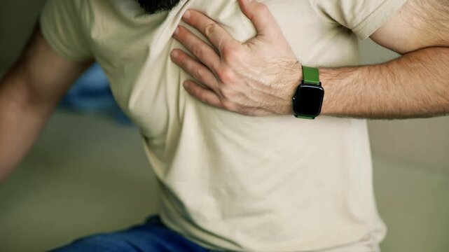 Man Sudden Chest Pain Holding His Heart. Feeling Unwell and Symptoms of Heart Attack or Sharp Pain in Thorax
