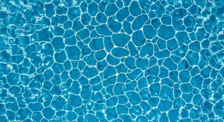 Obraz premium A close-up view of sparkling blue water with intricate light patterns on its surface