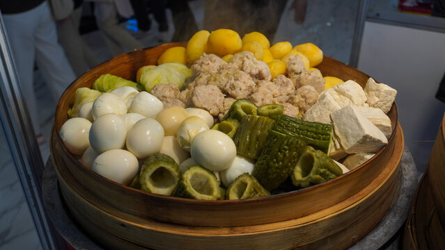 Siomay (also Somai), is an Indonesian steamed fish dumpling with vegetables served in peanut sauce. It is derived from Chinese Shumai. It is considered a light meal that is a type of Chinese Dim Sum.