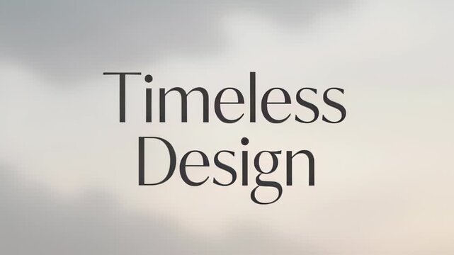 Elegant sky backdrop with serif typography displaying the words Timeless Design.