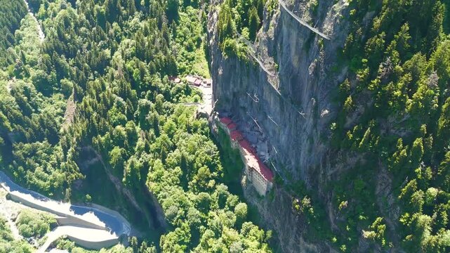 Altindere, Trabzon Province, Turkey. Sumela Monastery. Altindere Valley Park. Coniferous forest on the slopes. Aerial View, Departure of the camera