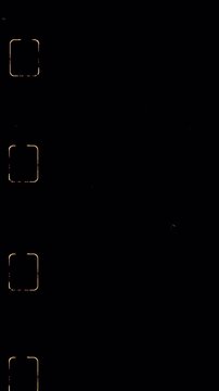 Vertical 16mm Film Strip Burn Overlay &ndash; Vintage Sprocket Light Leak 4K