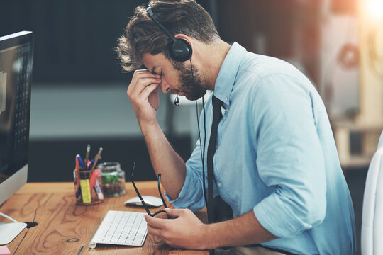 Computer screen, headache or man with headset in office, troubleshooting fail or client system glitch. Customer care stress, migraine or agent with tech support mistake, help desk or hotline crisis