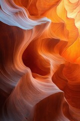 Obraz premium Glowing layered sandstone slot canyon with flowing sculpted curves and warm light evoking awe and serenity