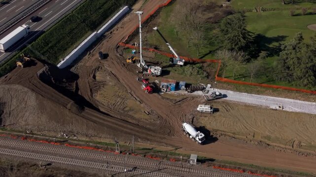 Aerial view of a construction site with heavy machinery working