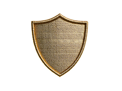 A gold shield patch on transparent background