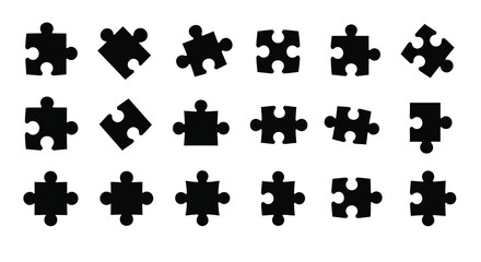 Naklejka premium Collection of black puzzle pieces displayed as a striking silhouette