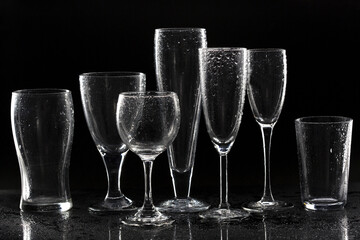 Empty Glasses with Condensation on Black Background