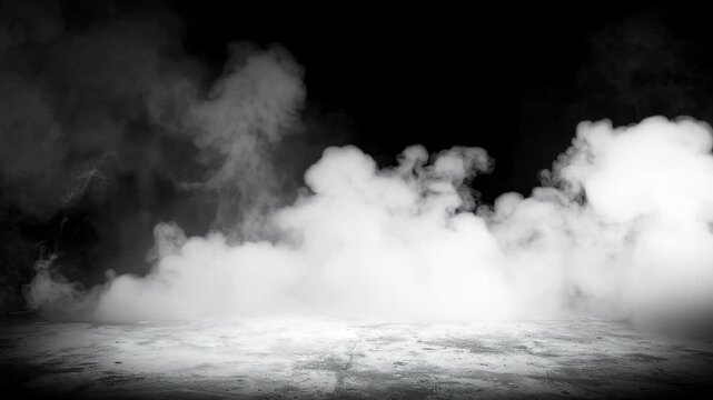 Dense white smoke billows across a dark background over a textured concrete floor
