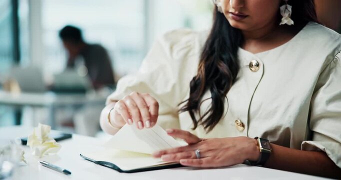 Business, woman and writing notes with mistake, tear page and frustrated with story error in office. Notebook, person and throw paper for fail, stress or copywriter restart with bad idea in workplace